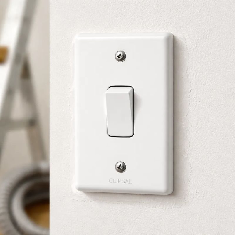 Electrician repairing residential wiring in San Antonio